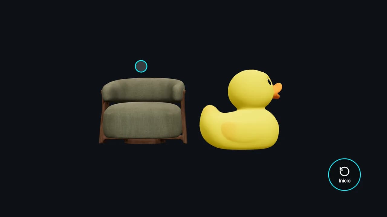 Un sillón y un pato de goma en 3D y, arriba del sillón, el cursor vacío de una mano